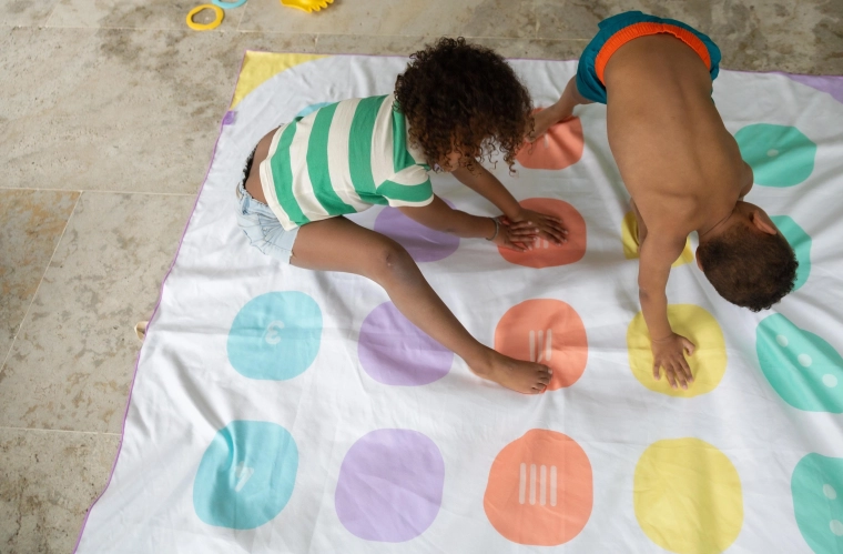 2 in 1: gioco e asciugamano in uno