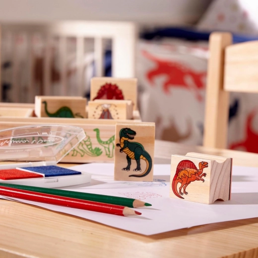 8 timbri in legno con dinosauri