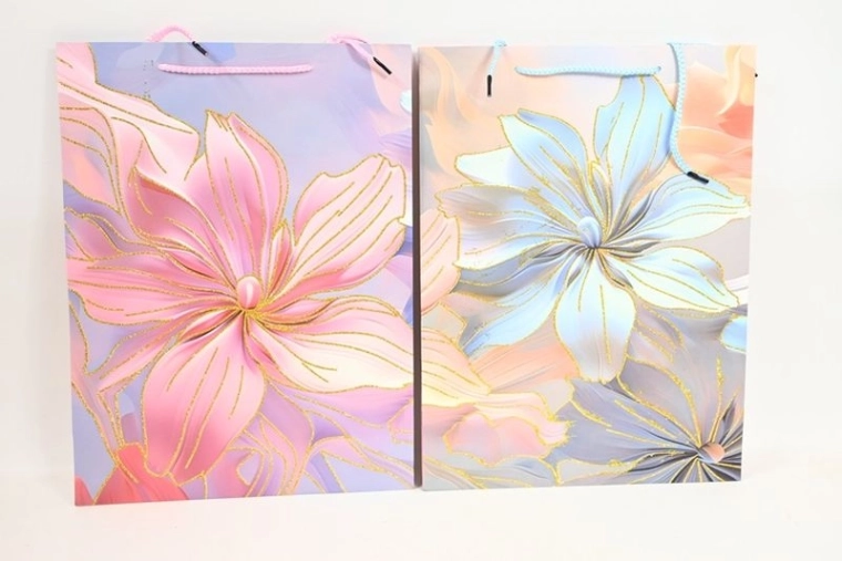 Grande borsa regalo con motivo floreale e dettagli dorati