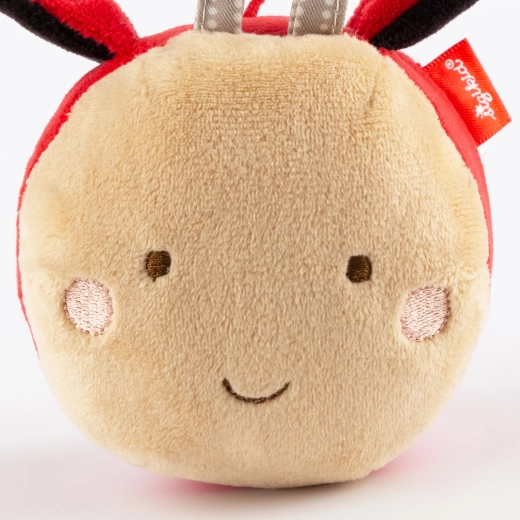 Peluche morbida, texture diverse e viso ricamato