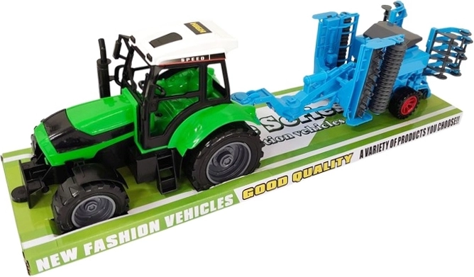 Trattore per bambini con attrezzo agricolo aggiuntivo