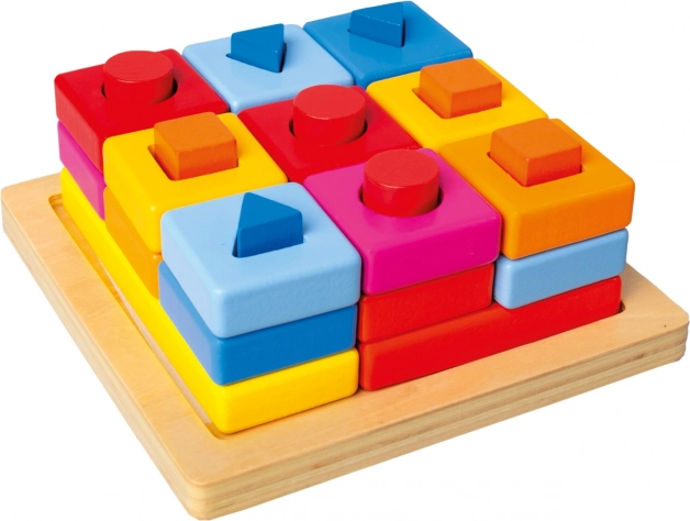 Bino forme ad incastro colorate su tavola