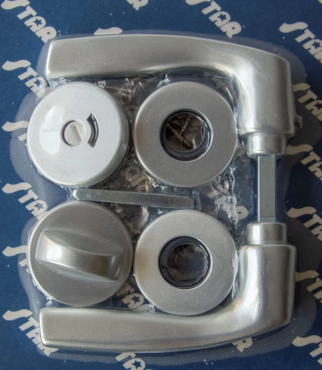 Maniglia rosetta per porta MONET WC, alluminio anodizzato argento