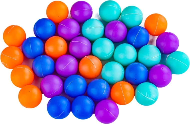 Palline colorate e bastoncini “formaggio” nella confezione