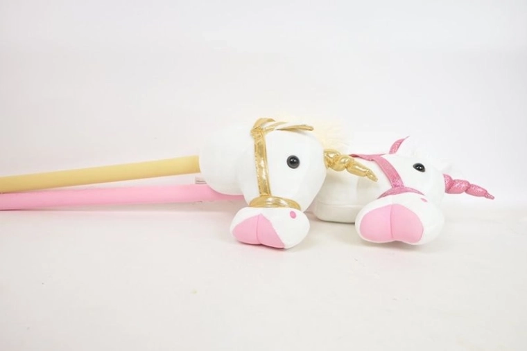 Unicorno di peluche su bastone con suoni