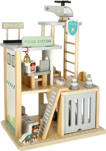 Stazione di polizia in legno con garage, auto ed elicottero