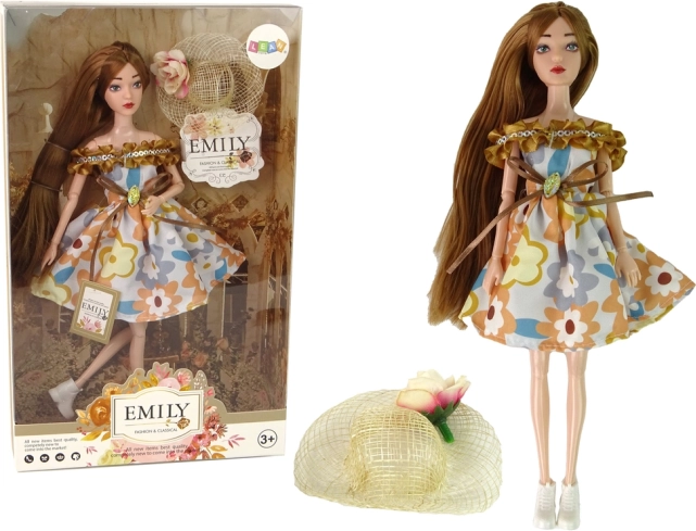 Bambola Emily con cappello autunnale e lunghi capelli castani