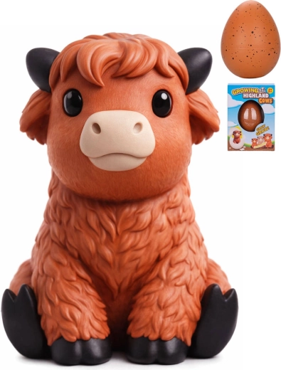 Figurina schiudente e crescente di mucca Highland scozzese
