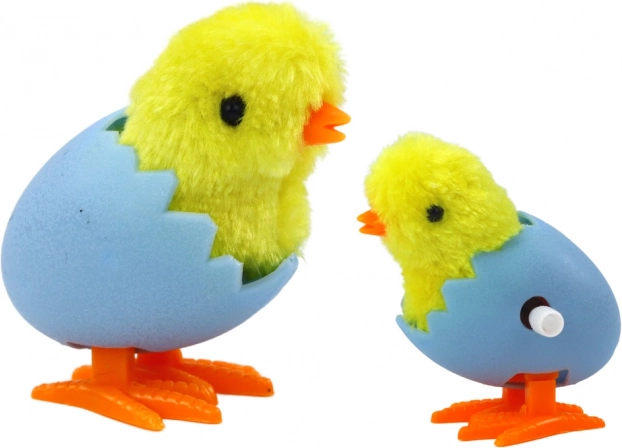 Pulcino a Carica nel Guscio Giallo