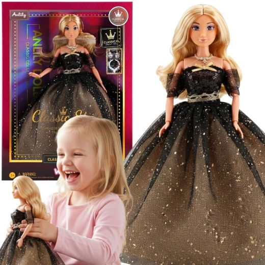 Bambola Woopie Royal Lily con abito nero e oro, 30 cm