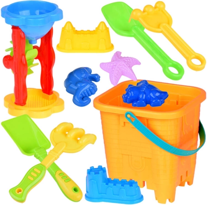 Set da sabbia con secchio, formine e strumenti