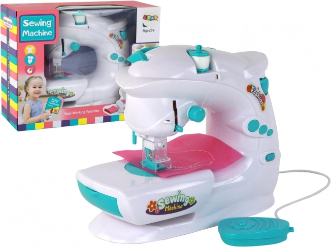 Macchina da cucire per bambini come una vera, bianca, a batteria