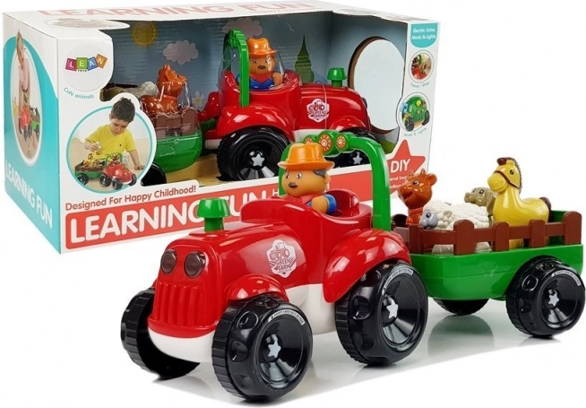 Trattore musicale con rimorchio e animaletti a batteria