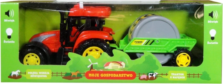 Trattore con rimorchio e modulo sonoro in polacco