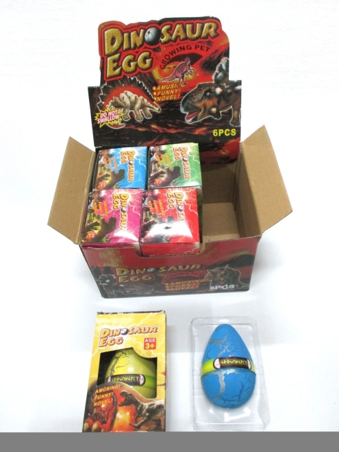 Uovo con dinosauro che cresce 12 × 8 cm