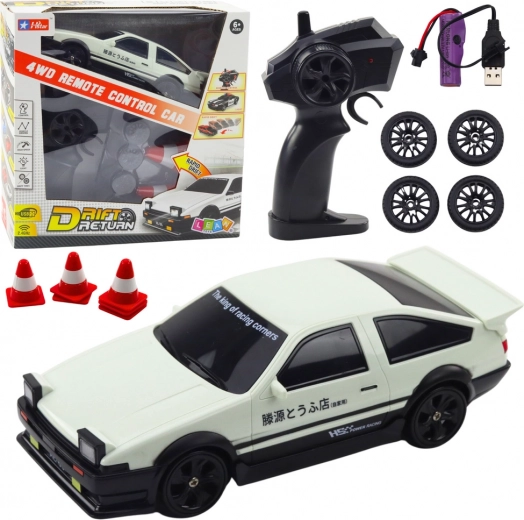 Auto da corsa telecomandata 4WD con ruote intercambiabili bianca