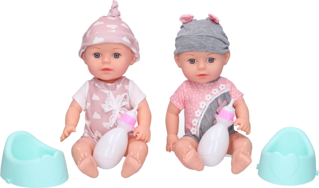 Bambola con vasino e biberon