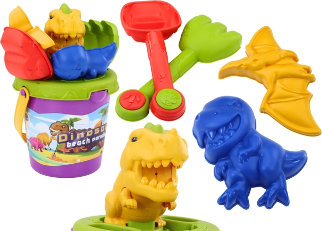 Set da sabbia con formine dei dinosauri – secchiello, paletta e rastrello