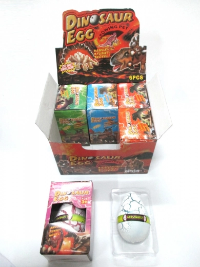 Uovo con dinosauro crescente 12x8 cm