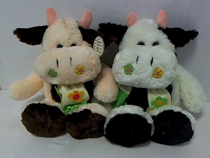 Mucca di peluche con fazzoletto floreale 45 cm