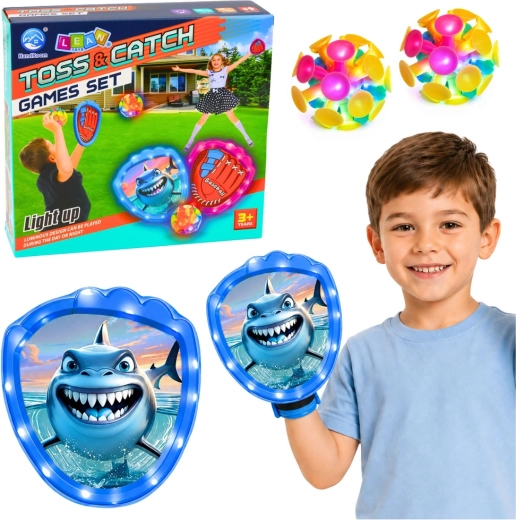 Gioco per bambini lancia e prendi – palette LED e palline a ventosa a tema squalo
