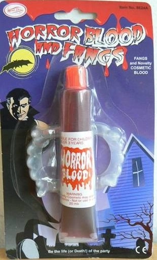 Denti da vampiro con sangue finto per costumi bambini