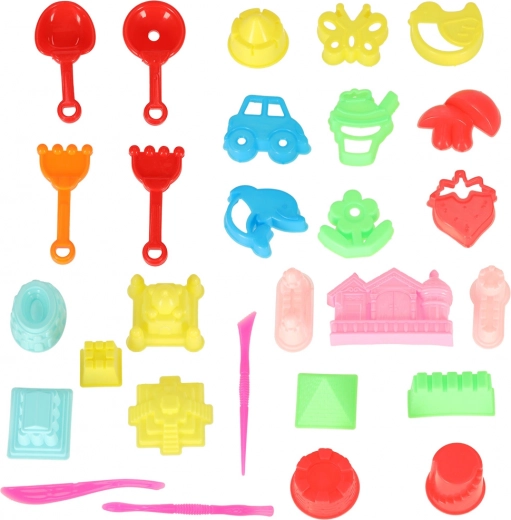 Giocattoli colorati per la sabbia - palette e formine