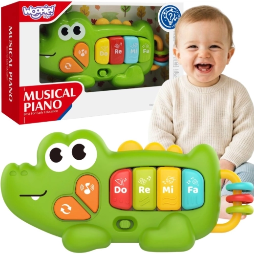 Pianoforte interattivo per bambini Woopie a forma di coccodrillo con suoni e luci 18m+