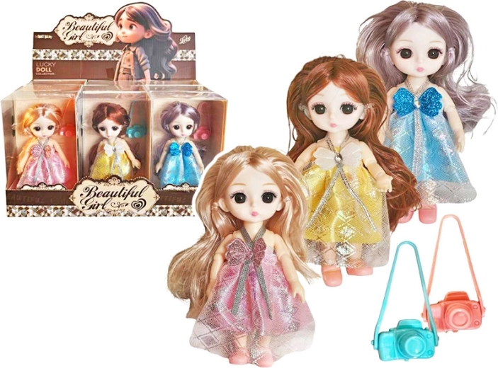 Bambola con fotocamera 15 cm