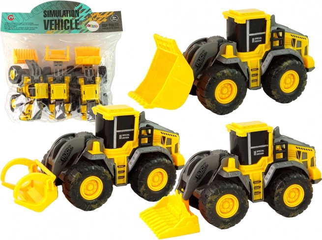 Set di tre veicoli da costruzione gialli