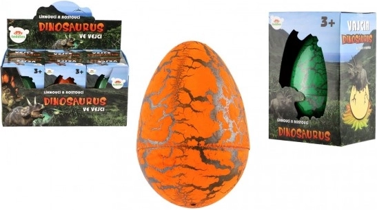 Uovo con dinosauro che si schiude