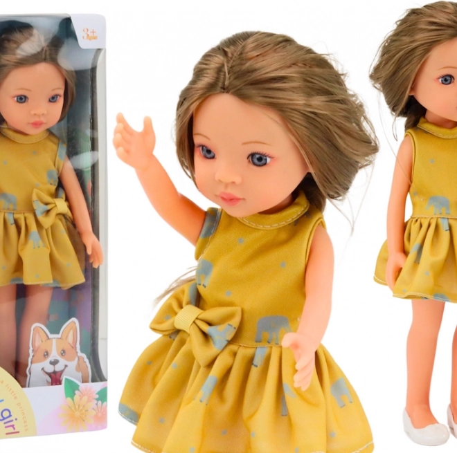 Burattino in abito giallo con capelli castani 33 cm