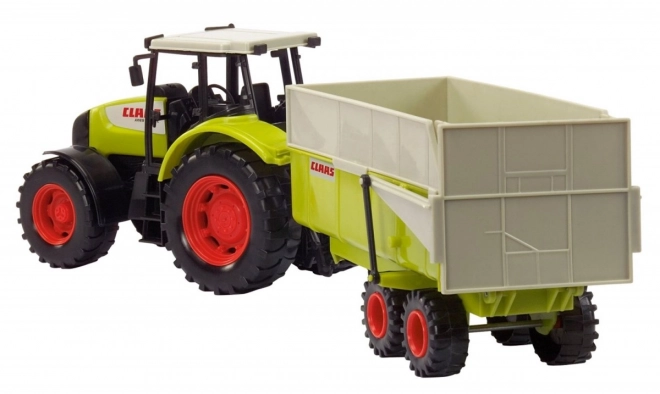 Trattore Claas Ares con rimorchio inclinabile