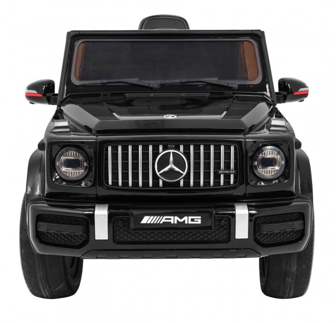 Mercedes AMG G63 per bambini Laccato nero + telecomando + MP3 LED + partenza lenta + EVA + cinture