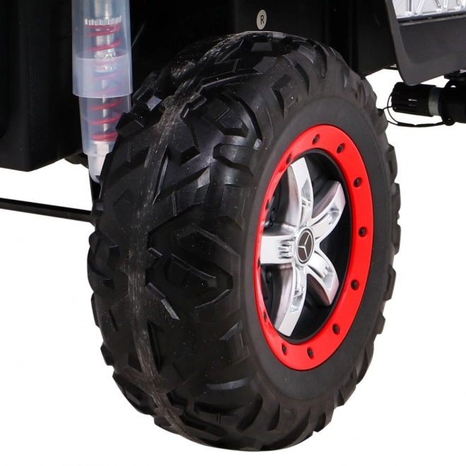 Mercedes Benz Unimog per bambini rosso + 4x4 + telecomando + portabagagli + avvio lento + MP3 LED