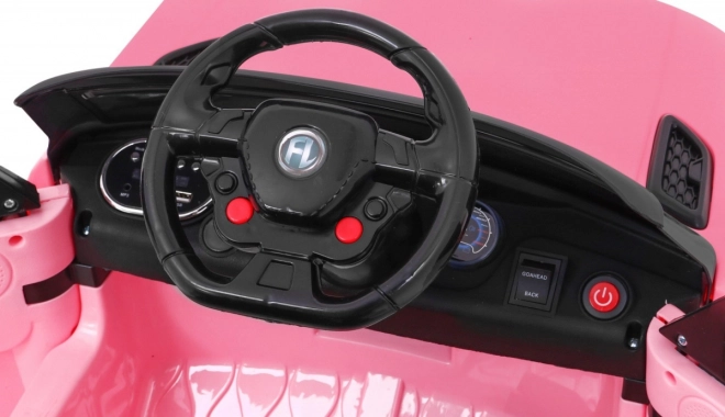 Auto elettrica per bambini rosa con radiocomando e funzioni di sicurezza