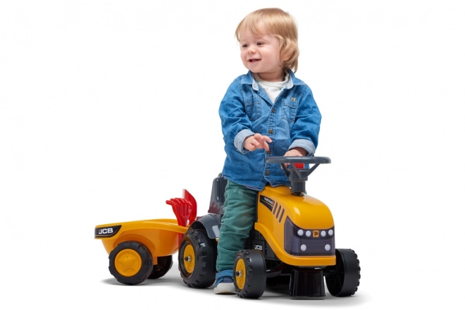 Odrážedlo Baby JCB giallo con rimorchio e pala