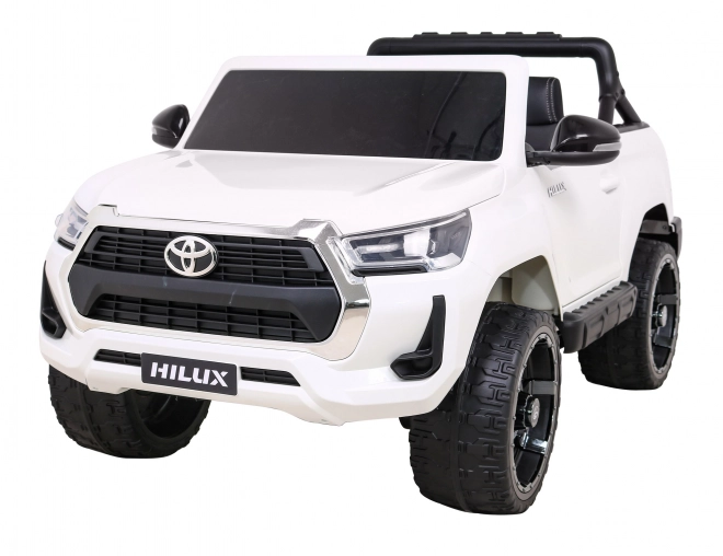 Toyota Hilux batteria per bambini Bianca + trazione 4x4 + telecomando + 2 portabagagli + radio MP3 + LED