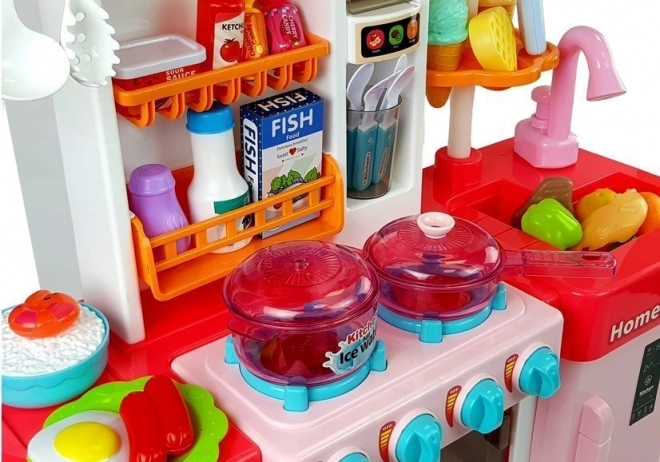 Cucina musicale con luci e acqua rosa