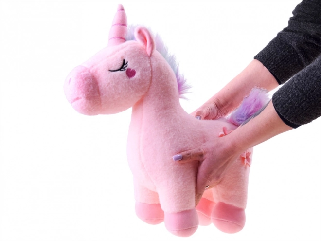 Unicorno di peluche magico