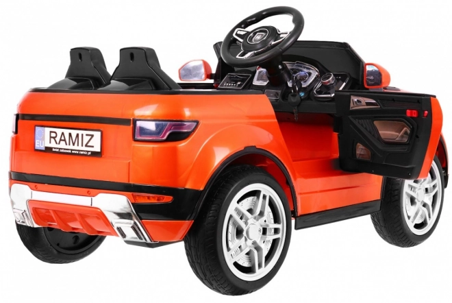 Macchinina elettrica sportiva Rapid Racer arancione