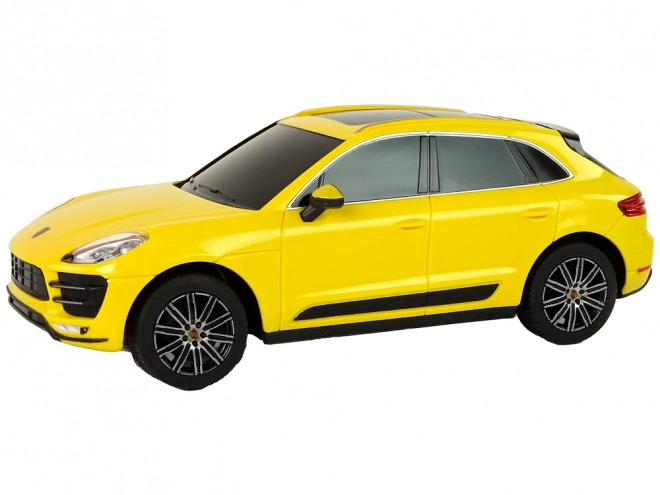 Auto radiocomandata Porsche Macan Turbo gialla 1:24