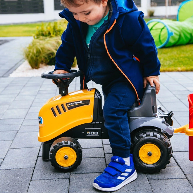 Odrážedlo Baby JCB giallo con rimorchio e pala