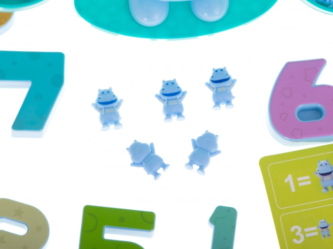Numeri e piccoli ippopotami per contare facilmente