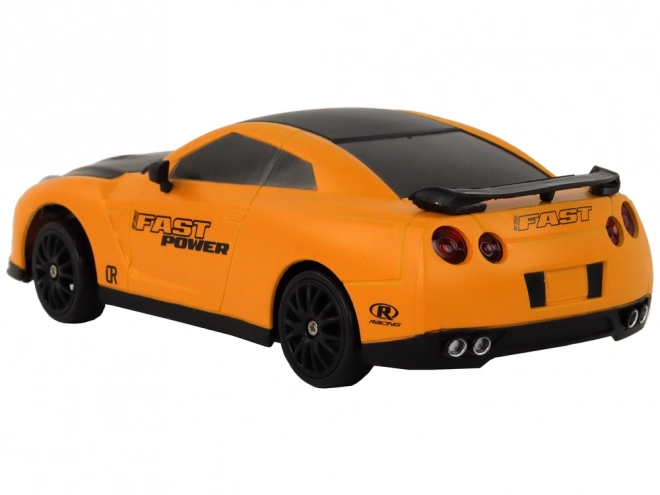 Auto sportiva telecomandata R/C 1:24 a ruote intercambiabili – Giallo