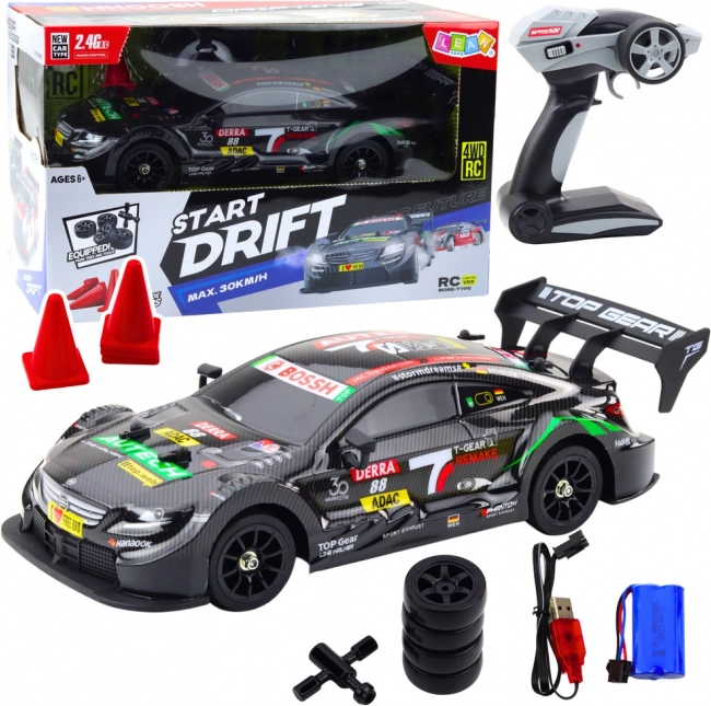 Auto da corsa telecomandato RC nero carbonio 30km/h 1:16