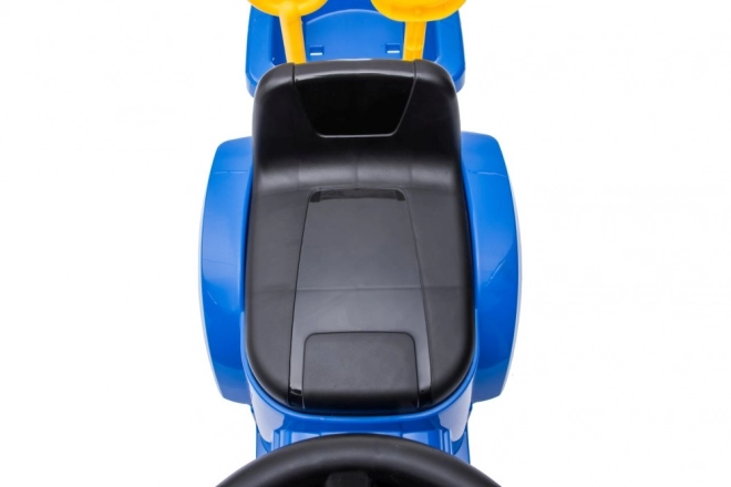 Trattore cavalcabile New Holland blu