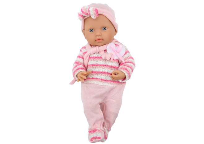Outfit rosa alla moda con maglioncino, cuffietta e sciarpa