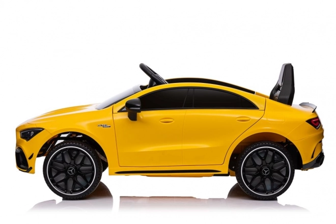 Auto elettrico per bambini Mercedes CLA 45s AMG giallo 4x4