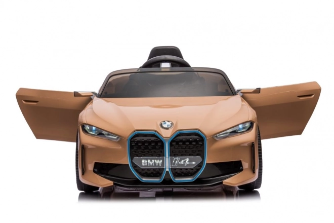 Auto a batteria BMW I4 dorato 4x4